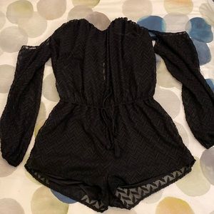 Black romper with sheer details